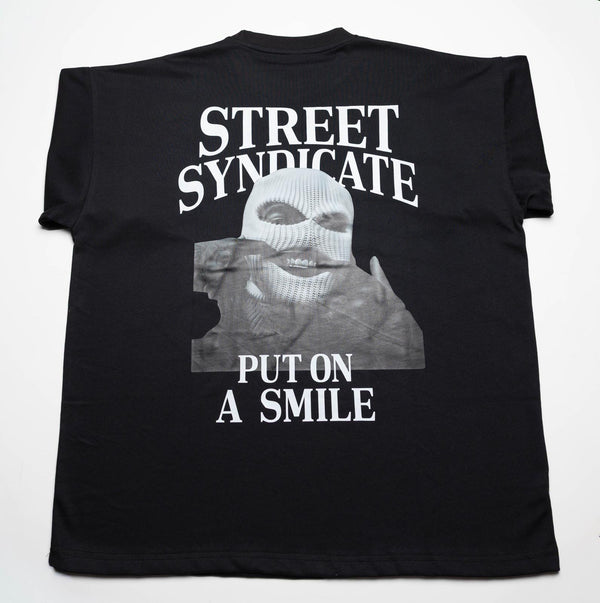 Put on a smile on over sized T.